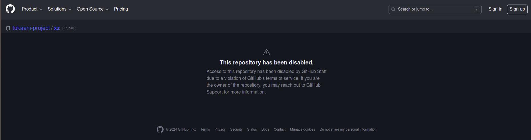 A warning message from GitHub that the repository has been disabled due to a violation of terms of service.